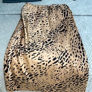 Long leopard print skirt.